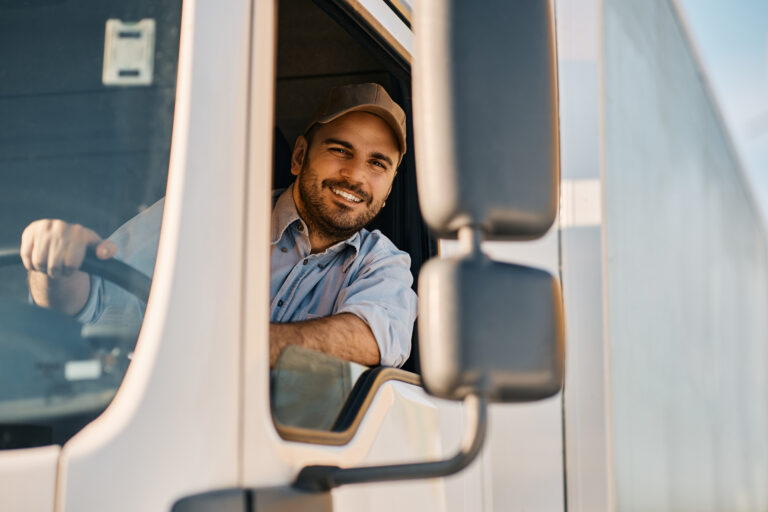 Happy trucker with a healthy FMCSA Snapshot